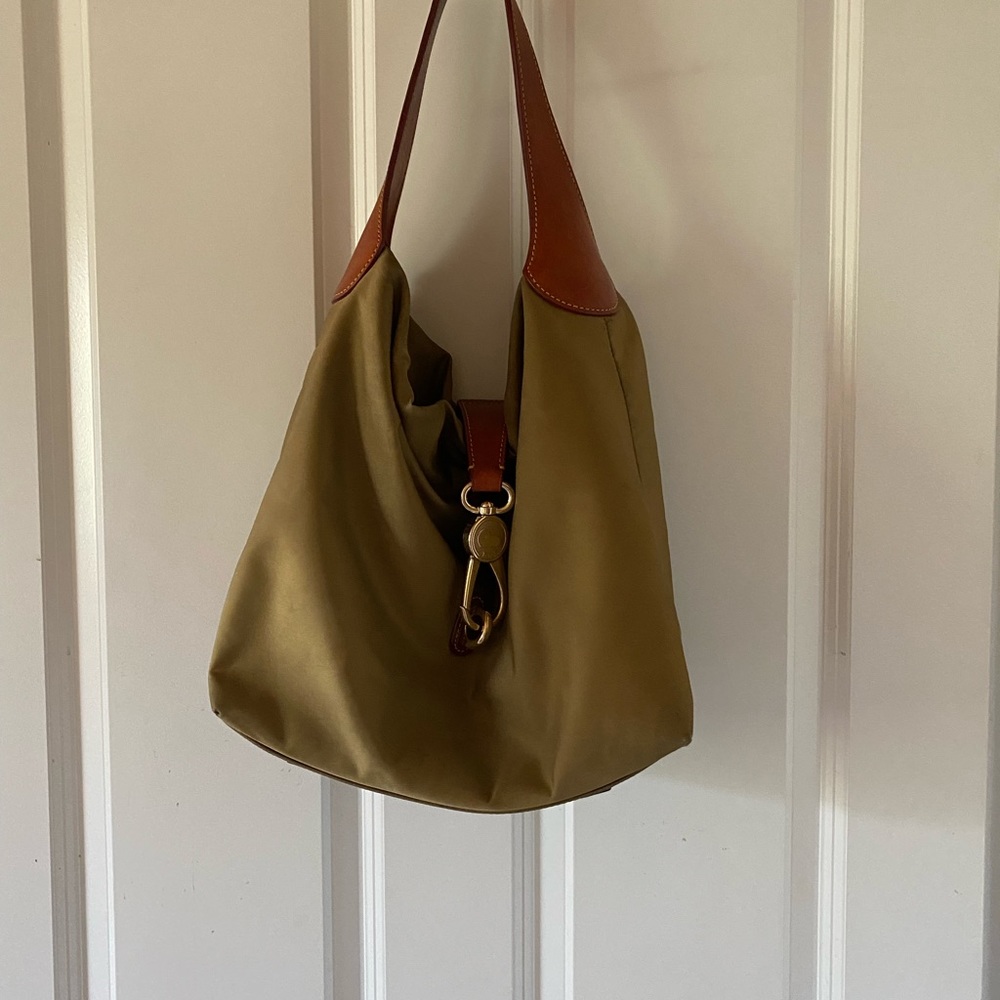Dooney & Bourke khaki nylon hobo bag. 12.25”x 10.5” x 6”d. Used. Small stains.